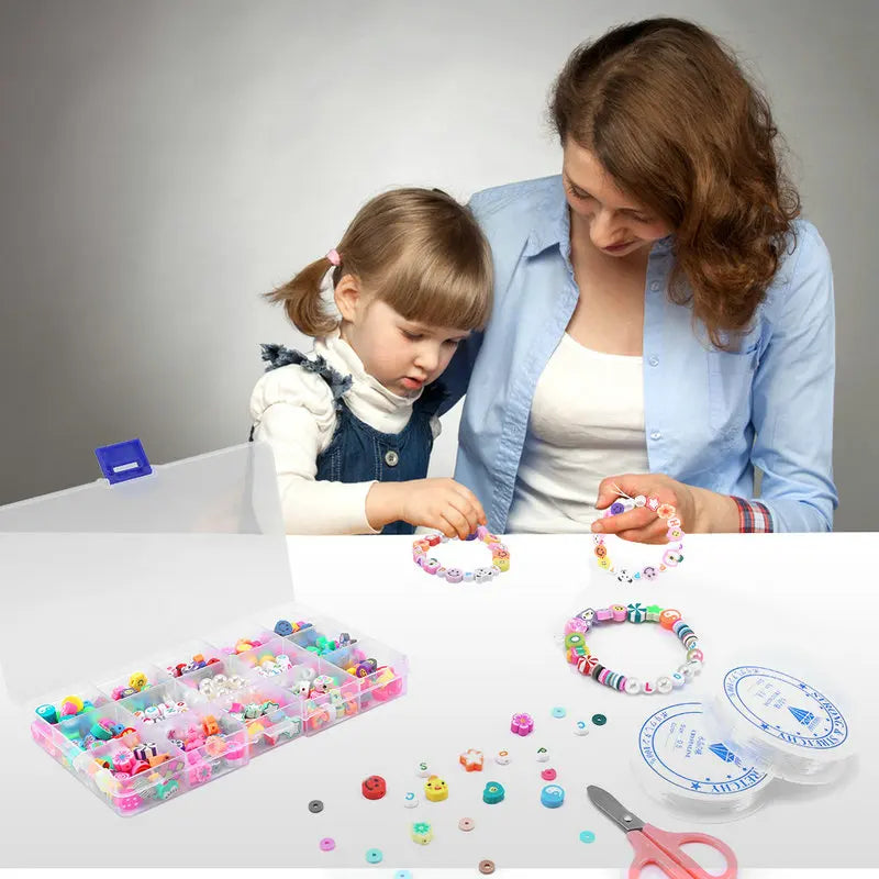 Mother and daughter using the polymer clay beads and charms kit