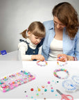 Mother and daughter using the polymer clay beads and charms kit